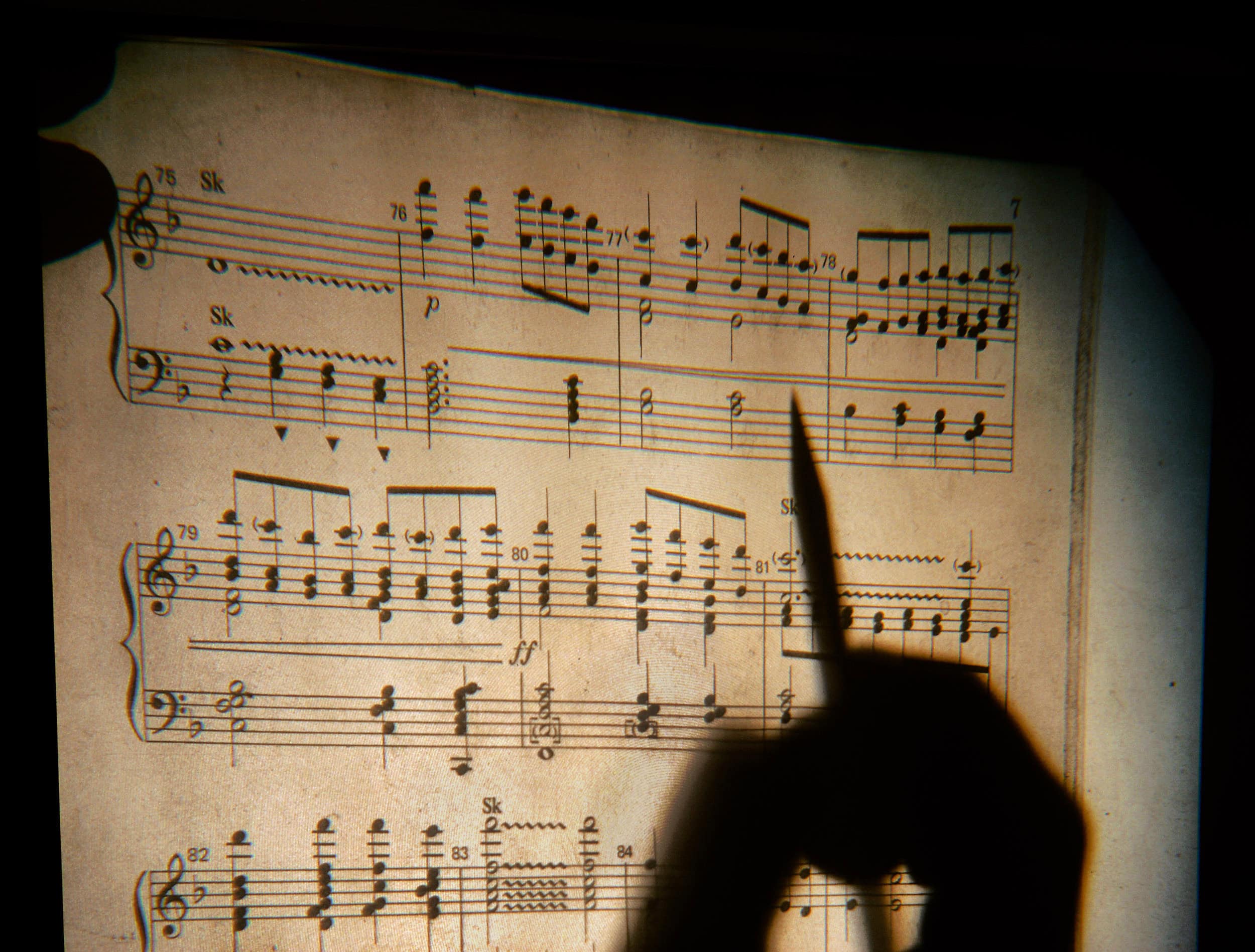 A person holding a pencil.